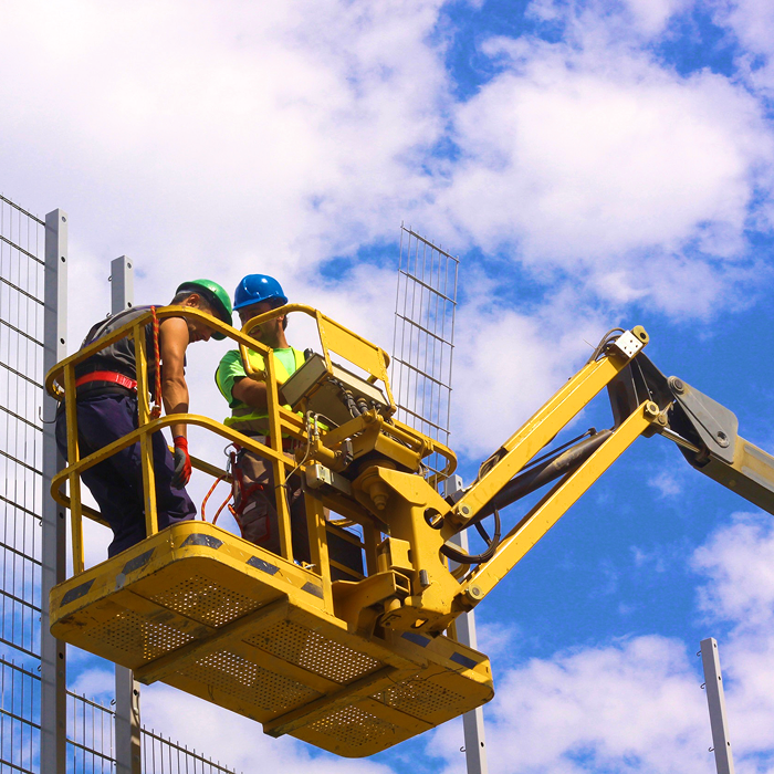 Workers on aerial lift platform